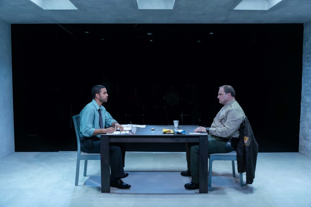 Actors in play on stage